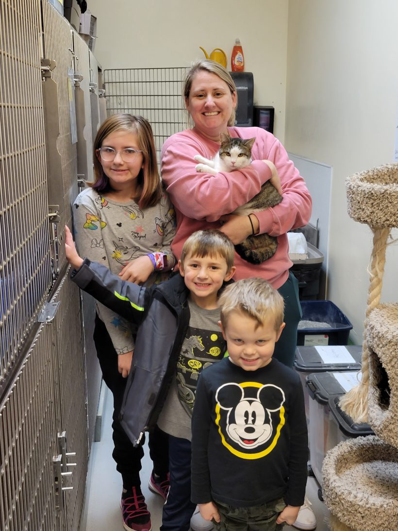 Cat Piper with her new family